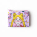 dfpbfriends purple canvas coin purse with Sailor Moon graphic and pink snap closure. Features 2 card slots and coin compartment.