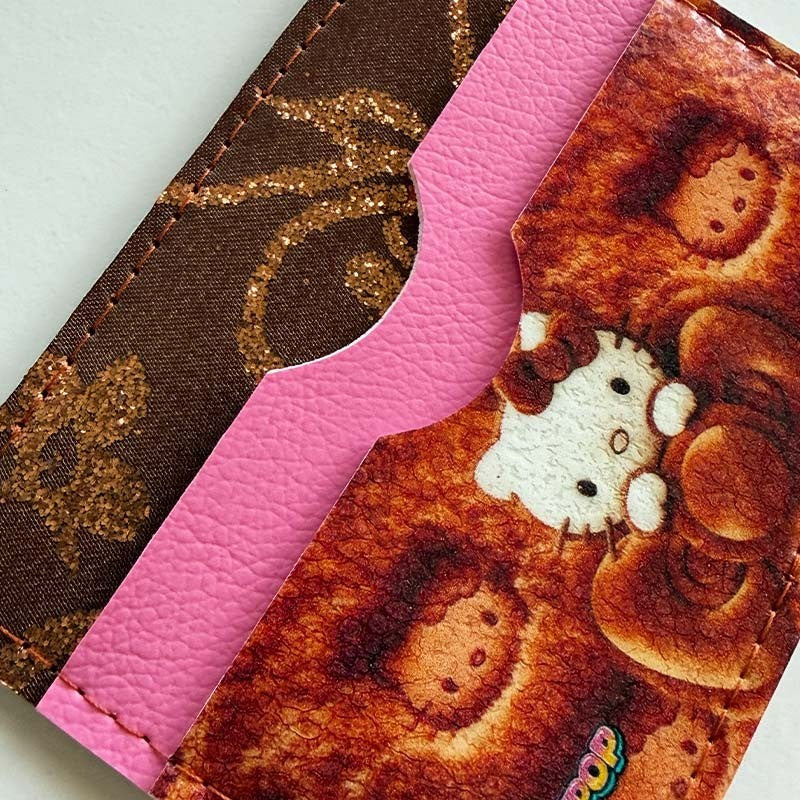 Tarjetero de cuerina Hello Kitty Winter